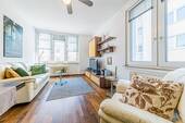 Wohnzimmer - Exzellent geschnittene 3-Zimmer-Wohnung nahe Dom und Main