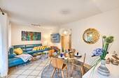 Wohnzimmer EG - 4-Zi. Wohnung mit West-Terrasse in Top-Strandlage Westerlands