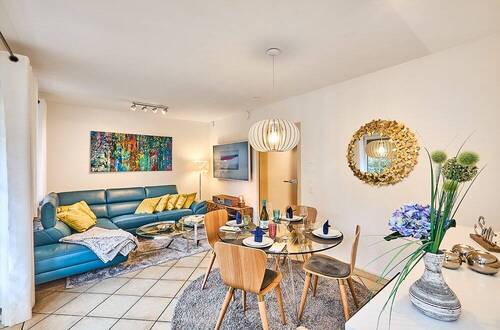Wohnzimmer EG - 4-Zi. Wohnung mit West-Terrasse in Top-Strandlage Westerlands