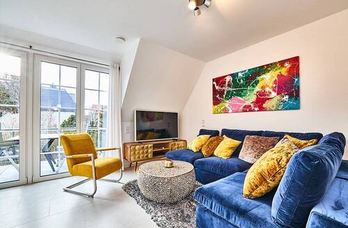 Wohnbereich - Stylische 4-Zi. FeWo mit Westbalkon in 1a-Strandlage von Westerland