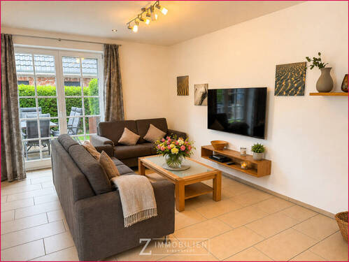 Gemütliche Sofaecke - 3 Zimmer Doppelhaushälfte zum Kaufen in Sankt Peter-Ording / Sankt-Peter-Dorf