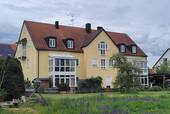 Hausansicht Süden - Bezugsfreie 3 Zimmer-Wohnung mit Wintergarten