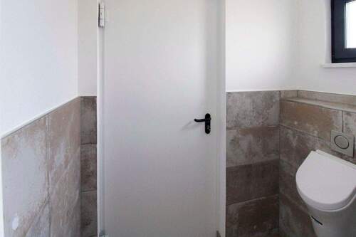 Gäste-WC Zugang zur Garage - 