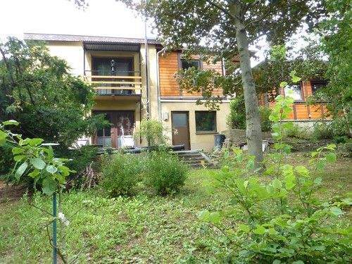 Garagengebäude mit angrenzenden Gartenhaus - 