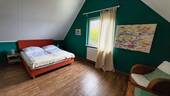 Schlafzimmer im Dachgeschoss - 