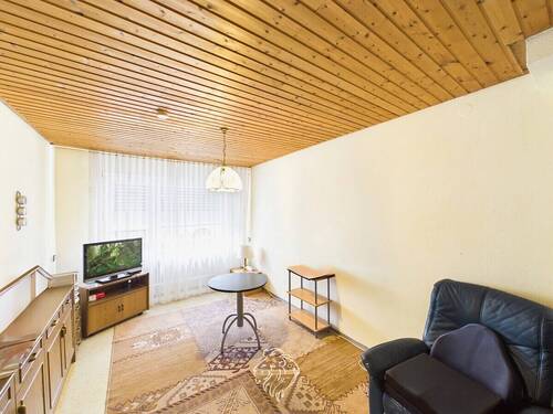 Wohnzimmer_EG - Einfamilienhaus mit 140,00 m&sup2; in Eibelstadt zum Kaufen