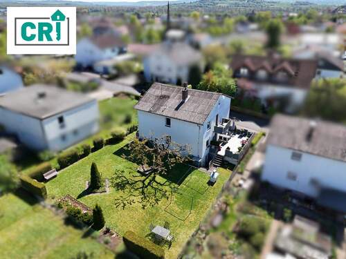Außenansicht - Charmantes Zweifamilienhaus mit traumhaftem Garten & vielseitigem Potenzial in beliebter Wohnlage von Kirchhain