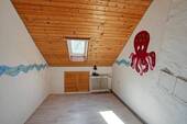 Zimmer im Dachgeschoss - 