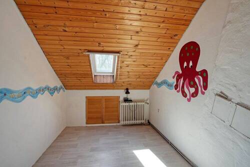 Zimmer im Dachgeschoss - 