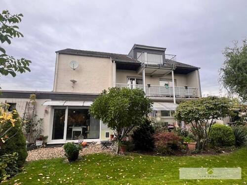 Gartenansicht der Immobilie des Dreifamilienhauses - Mehrfamilienhaus, Wohnhaus mit 269,00 m² in Welver zum Kaufen