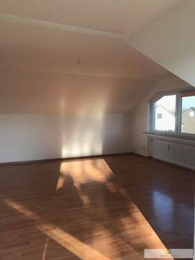 Wohnzimmer zur Dachgeschoss-Wohnung - 