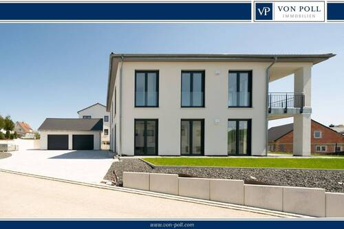 Bild 1 - Ankommen, durchatmen, genießen: Neues Einfamilienhaus mit Einliegerwohnung, Garten und Doppelgarage