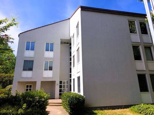 Vorderansicht - Helle und großzügige 4-Zimmer-Wohnung mit grünem Ausblick