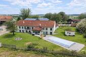 00_Hausansicht_Süden (KI) - Exklusives Anwesen mit Weitblick - Wohnen und Arbeiten perfekt kombiniert!