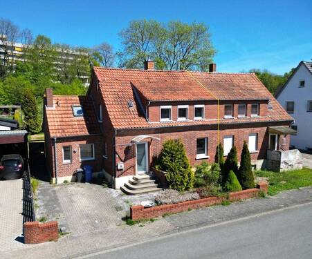 Außenansicht - Ruhige Sackgasse, viel Grundstück - Doppelhaushälfte mit Potential in Lengerich.