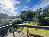 Blick vom Balkon in den Garten und zur Marcusheide - 