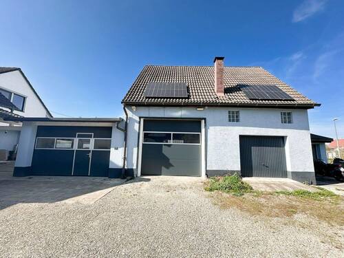Ansicht Garage 1+2 - Etagenwohnung mit 137,00 m² in Holzheim zum Kaufen