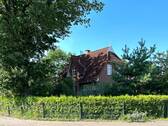 1_Ansicht_Ecke Reiherstieg.jpeg - Einfamilienhaus, großzügiger Garten, Sauna und Ausbaupotenzial