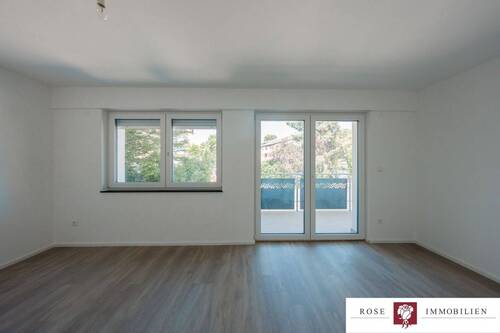 ETW Nr. 4 - EG links - Wohn- und Esszimmer Bild 1 - 