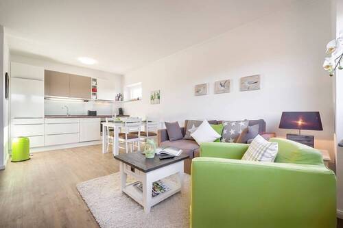 Wohnzimmer - 2 Zimmer Etagenwohnung zum Kaufen in Wenningstedt-Braderup (Sylt)