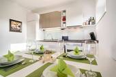 Essplatz und Küche - Etagenwohnung mit 54,30 m² in Wenningstedt-Braderup (Sylt) zum Kaufen