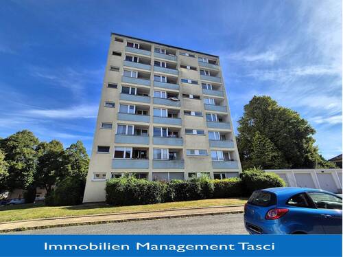 Rückansicht - Single Wohnung mit Einbauküche und Balkon