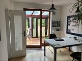 Essecke und Zugang zum Wintergarten - 
