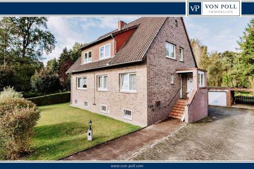 Titelbild - Zweifamilienhaus am Ufer der Ilmenau - Massiv gebaut, viel Platz, großes Potenzial