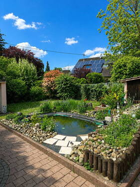 Garten mit Grünfläche - Mehrfamilienhaus, Wohnhaus mit 197,10 m&sup2; in Wiesbaden zum Kaufen