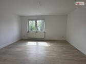 Wohnzimmer 3.OG links 1.2 - 