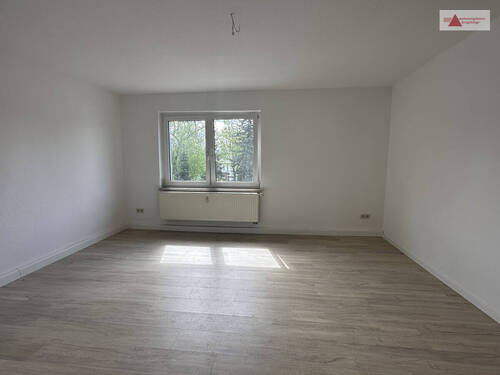 Wohnzimmer 3.OG links 1.2 - 