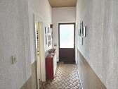 Flur mit Ausgang zur Terrasse - 
