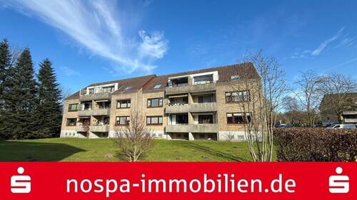 Rückansicht - Modernisierte, sonnige 3-Zimmer-Dachgeschosswohnung mit Balkon und PKW-Stellplatz