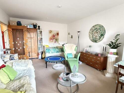 Wohnzimmer - Etagenwohnung mit 62,60 m&sup2; in Wardenburg zum Kaufen