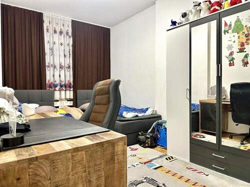 Kinderzimmer im Erdgeschoss - 