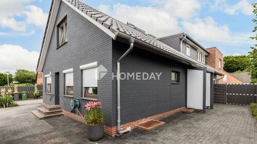 Außenansicht 2 - 1 Zimmer Mehrfamilienhaus, Wohnhaus zum Kaufen in Großenkneten