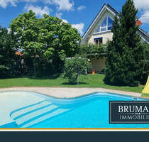 BRUMANI | Modernes Einfamilienhaus mit hochwertigem Anbau, Doppelgarage und Pool in Buggingen