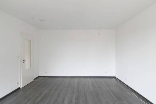 Wohnzimmer - Etagenwohnung mit 70,90 m&sup2; in Leck zum Kaufen