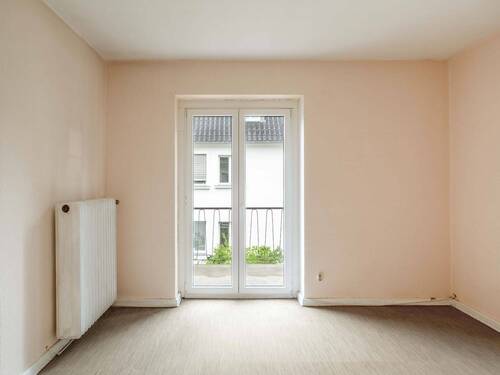 Wohnen mit Balkon (Einliegerwohnung, OG) - 