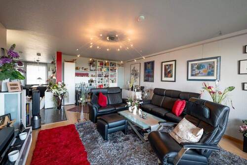 140_Das gemütliche Wohnzimmer.jpg - Terrassenwohnung mit 94,00 m&sup2; in Frankfurt am Main zum Kaufen