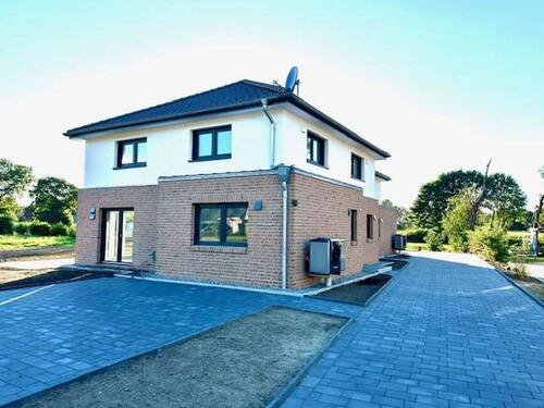 Seitenansicht Wischhof 9 a - 5 Zimmer Doppelhaushälfte zum Kaufen in Düdenbüttel