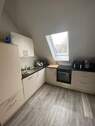 Offene Küche mit EBK - 1 Zimmer Etagenwohnung in Kirchlinteln