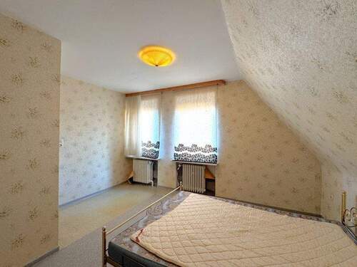 Schlafzimmer im Dachgeschoss - 