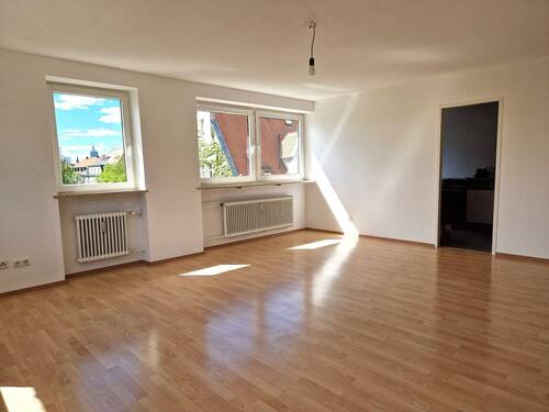 Wohnzimmer Teilansicht - Etagenwohnung mit 84,00 m² in München zum Kaufen