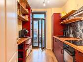 Küche mit Terrassenzugang - Terrassenwohnung mit 82,70 m&sup2; in Leipzig zum Kaufen