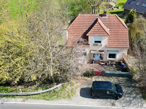 Luftbild Vorderseite - 7 Zimmer Einfamilienhaus in Loxstedt / Stotel