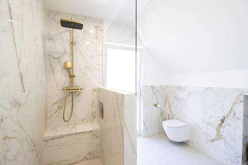 Badezimmer - Einfamilienhaus mit 127,00 m&sup2; in München zum Kaufen