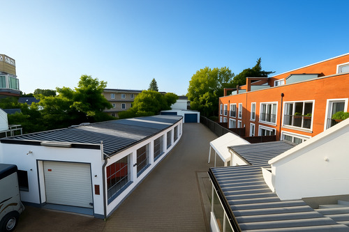 Blick aufs Grundstück vom OG - Zwei-Familienhaus mit KFZ-Werkstatt, Garagen und Ausstellungsraum