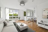 Bild 1 - Ihr Rückzugsort im Grünen: Lichtdurchflutete 2-Zimmer Erdgeschosswohnung mit Garten