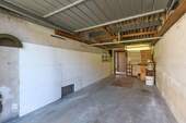 Garage mit Zugang zum Garten - 
